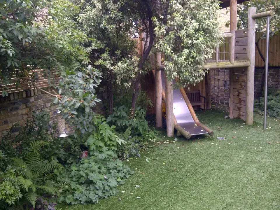 An established lawn and garden borders from the Green Fingers Gardens project archive